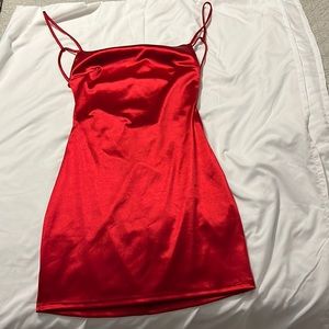 Red satin mini dress. Great condition, no tags but never worn. Size Medium.